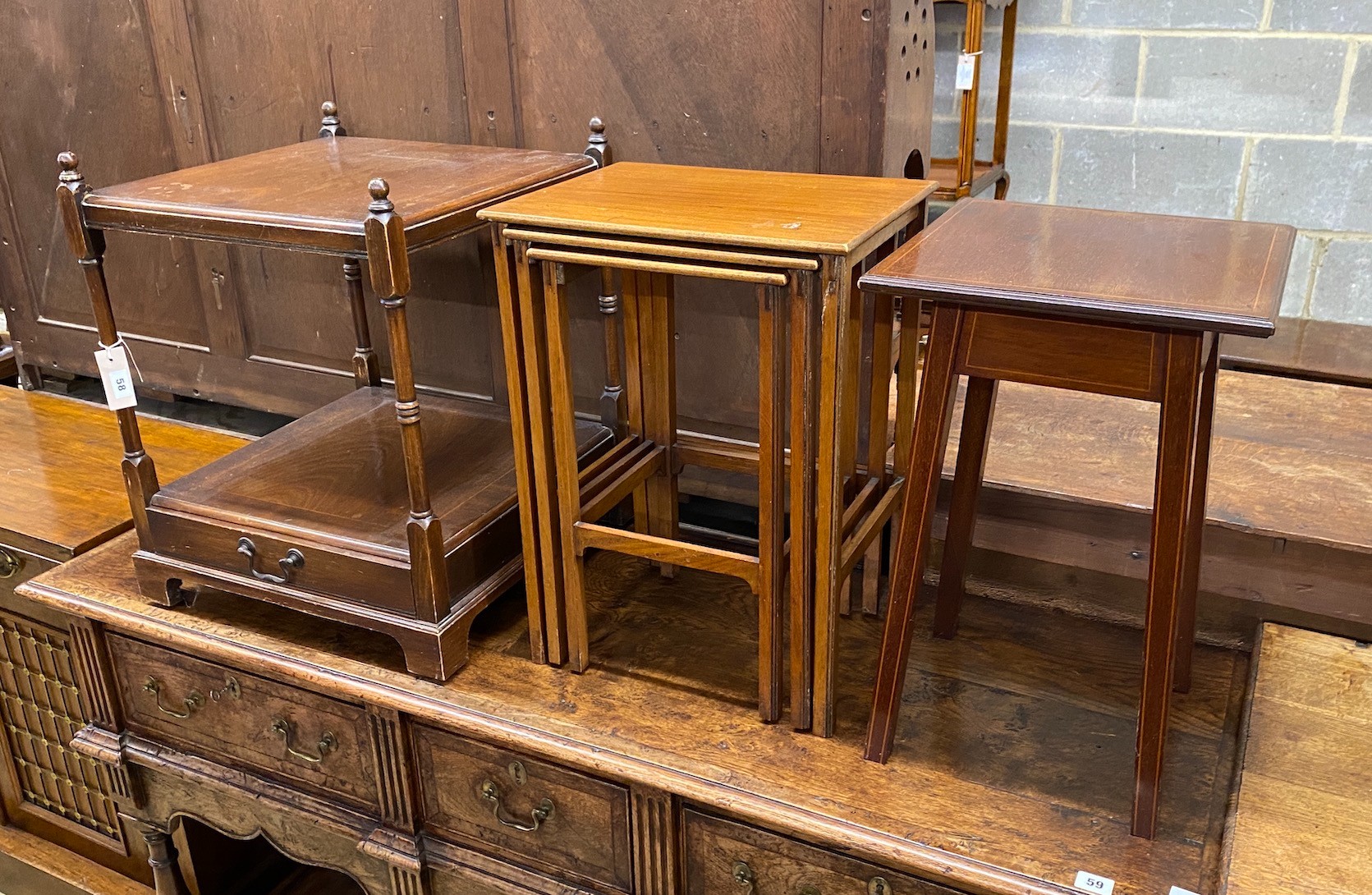 A nest of three Edwardian mahogany tea tables, height 54cm, an Edwardian side table and a reproduction two tier table